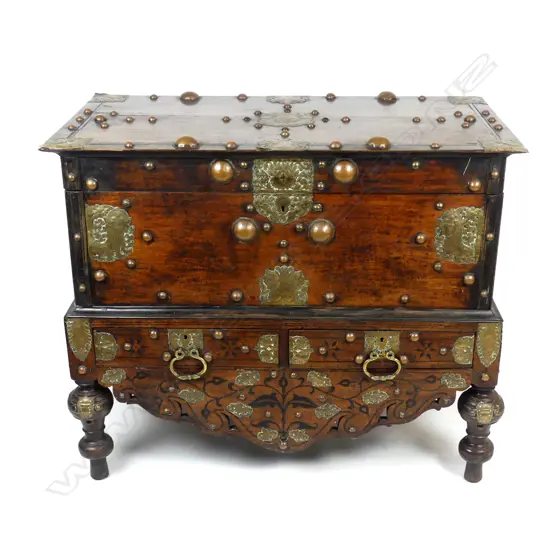 A Dutch-Indonesian teak coffer on turned legs