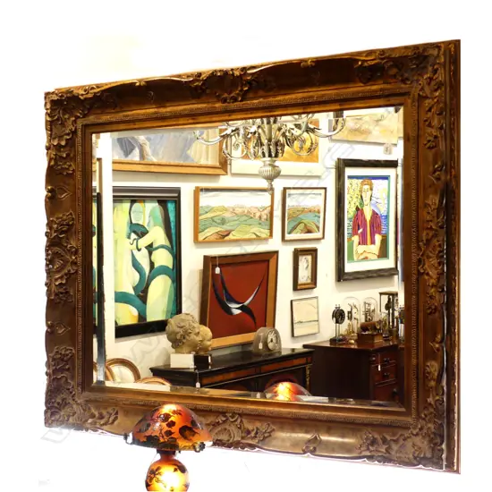 A large and impressive antique style mirror