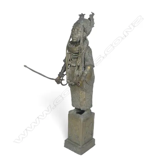 An impressive early 20thC Benin bronze figure,