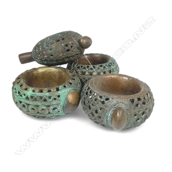 Four early 20thC Benin bronze currency bangles,