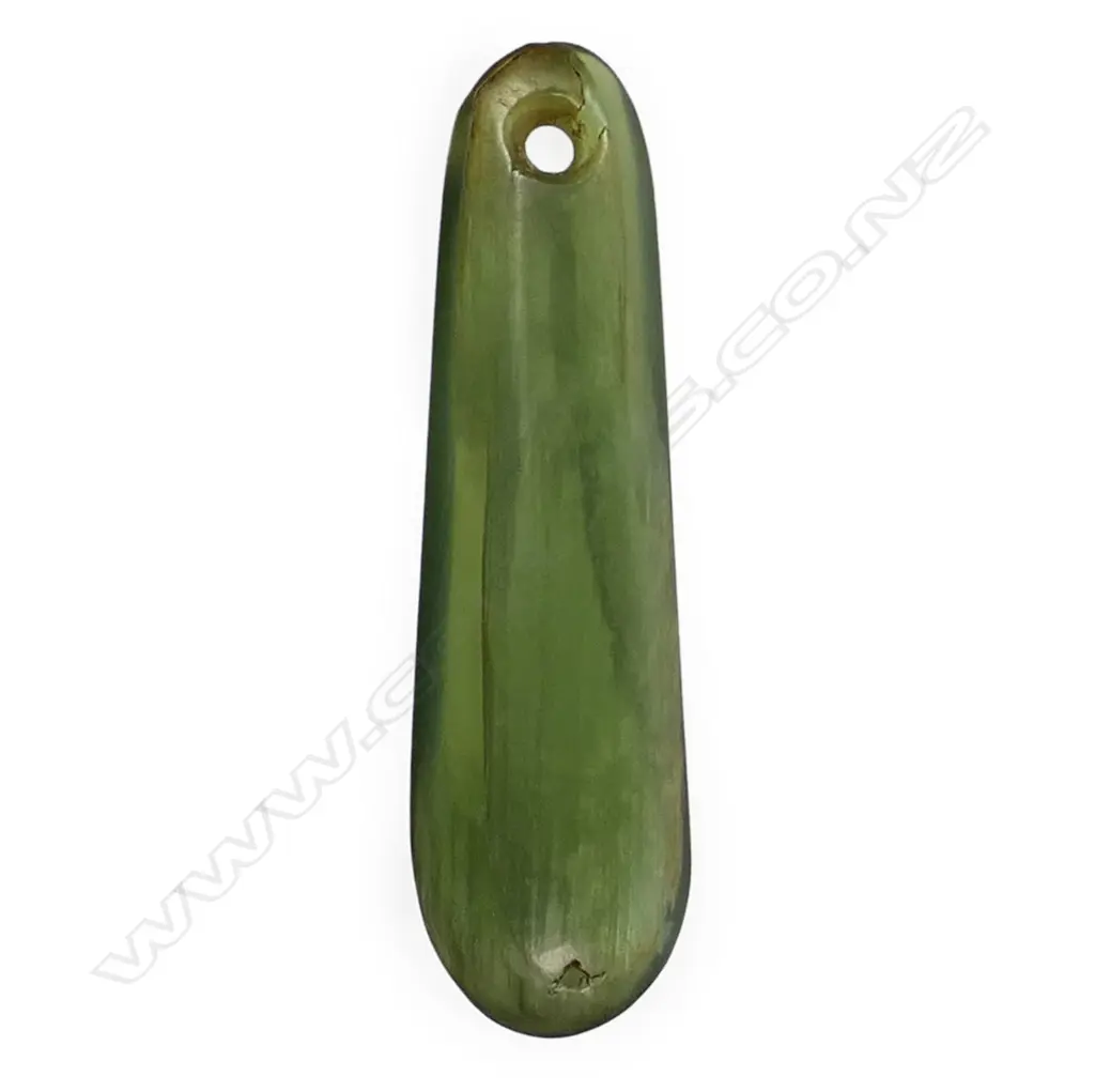 An old Māori pounamu kuru pendant, Image 1++