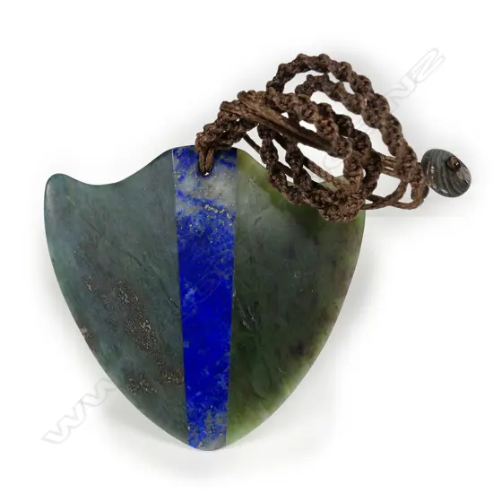 Yannis Petzold totoweka pounamu and lapis ray (whaitere) form pendant,