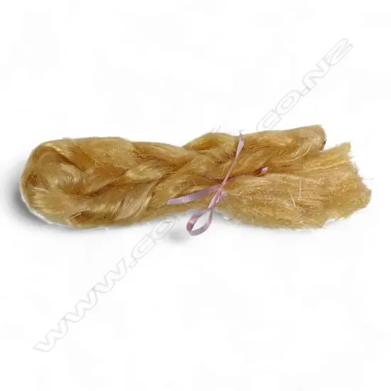 A vintage plait of kauri gum hair,
