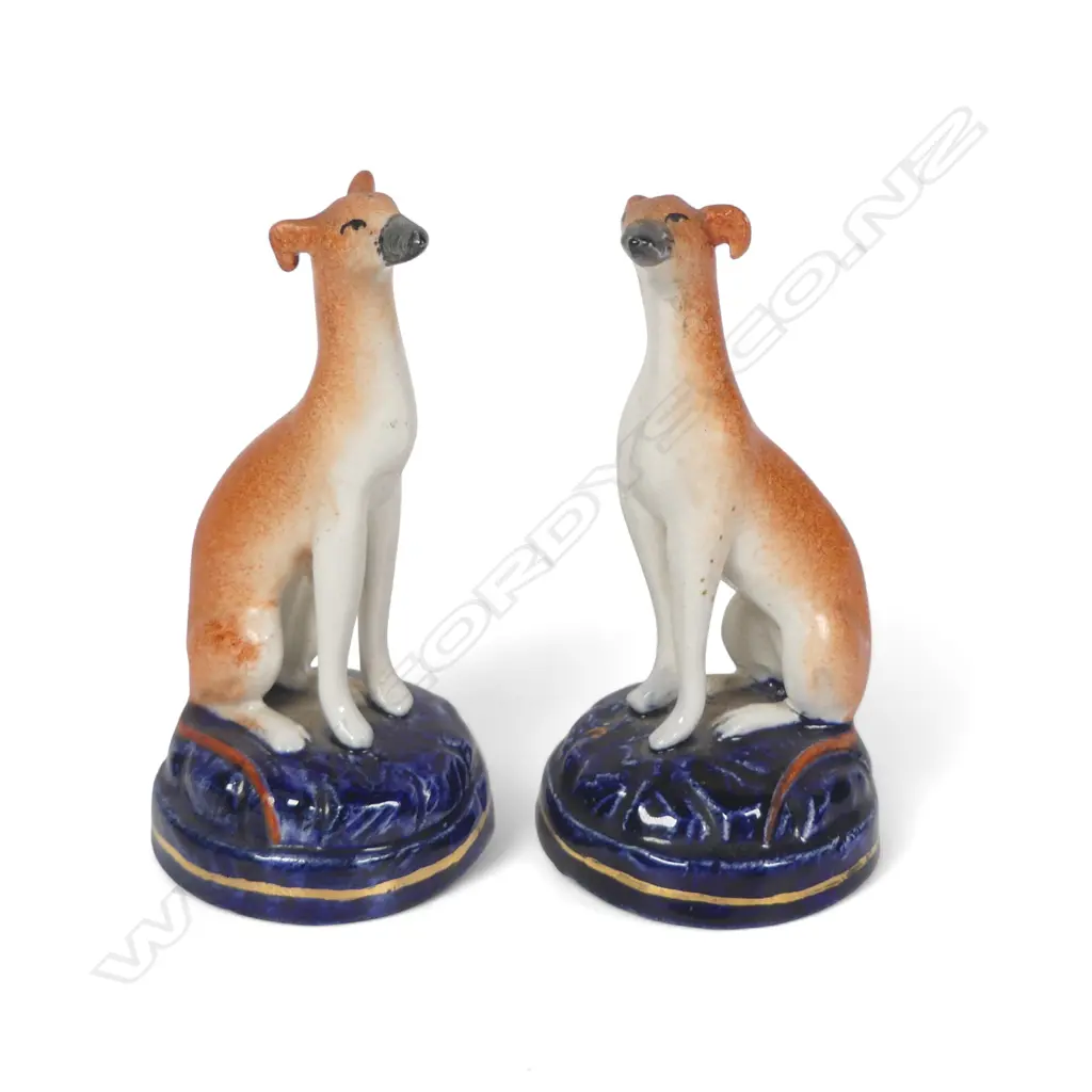 A pair of Victorian Staffordshire small seated hounds, Image 1++