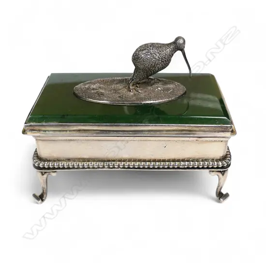 An early 20thC silver and greenstone trinket box,