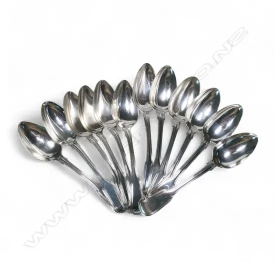 A composite set of 12 George III and IV silver dessert spoons,