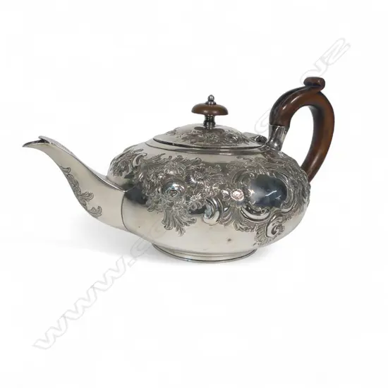 George IV silver embossed teapot,