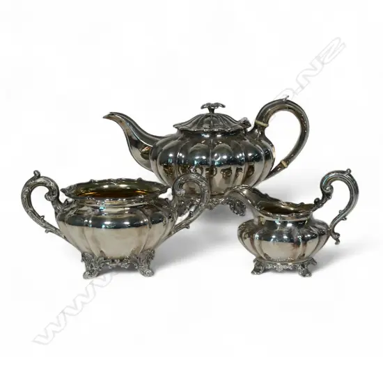 A composite William IV and Victorian silver three piece tea set,