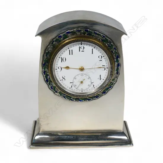 A Liberty & Co. Cymric silver-mounted clock,