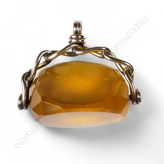 A 9ct gold spinner fob,