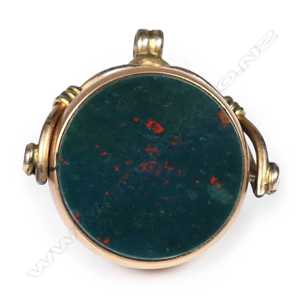 A 9ct rose gold spinner, Image 1++