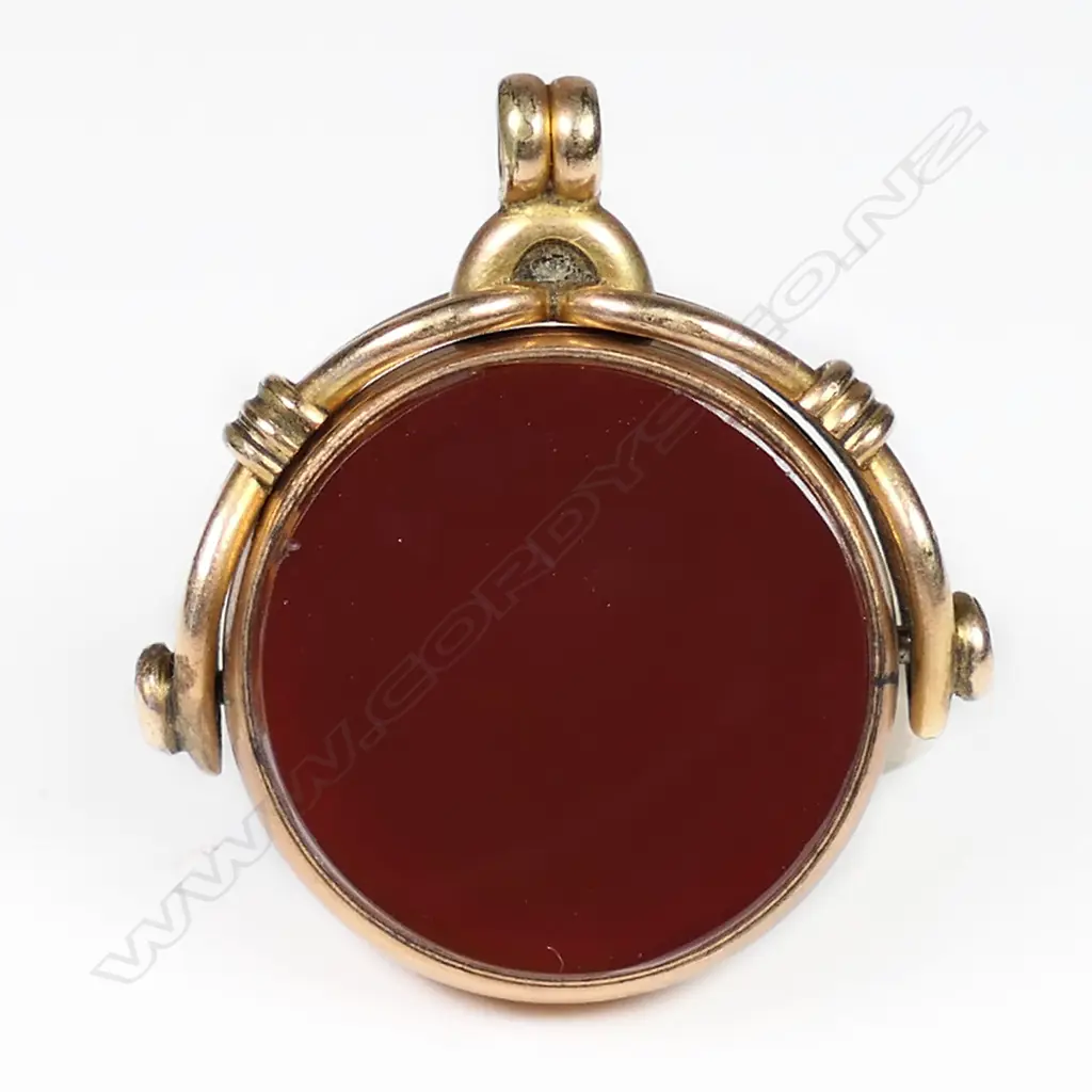 A 9ct rose gold spinner, Image 1++