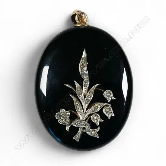 A Victorian memorial gold top black onyx and seed pearl large locket,