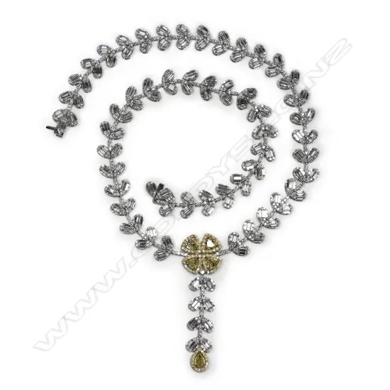 An impressive modern 18ct white gold white and yellow diamond multi stone necklace,