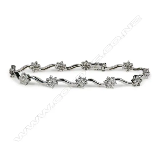 An 18ct white gold and diamond bracelet,