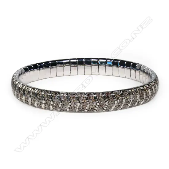 A 9ct white gold and diamond bracelet,
