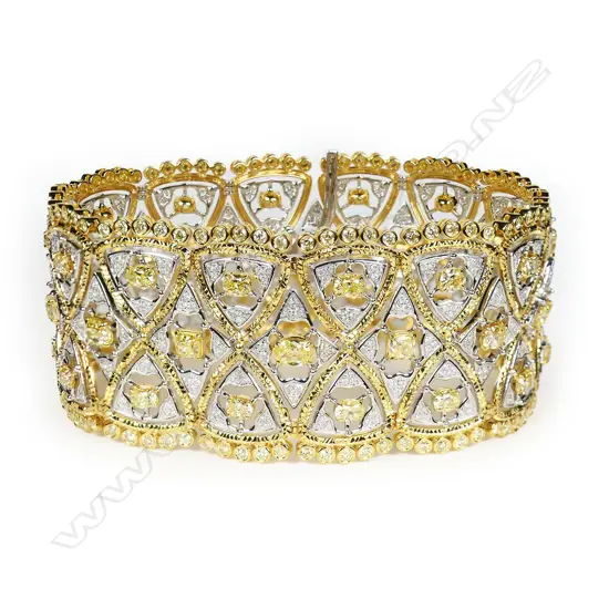 An impressive 18ct yellow and white gold diamond bracelet,