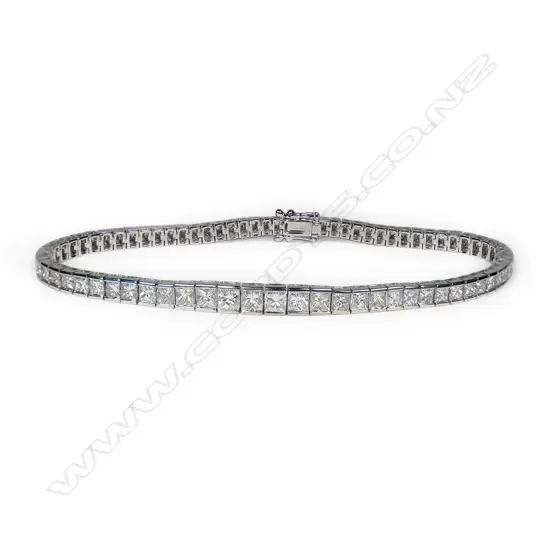 An 18ct white gold and diamond tennis bracelet,