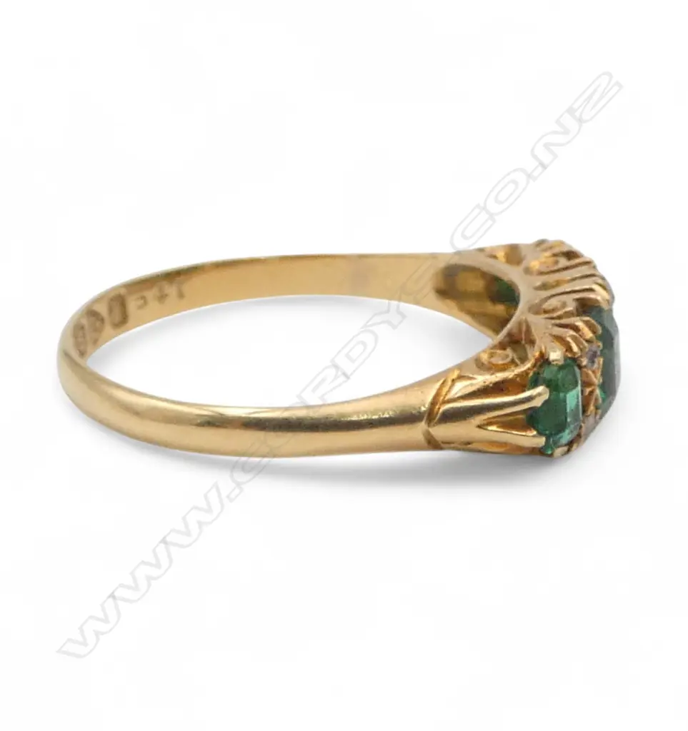 An Edwardian 18ct yellow gold emerald and diamond bridge ring, Image 1++