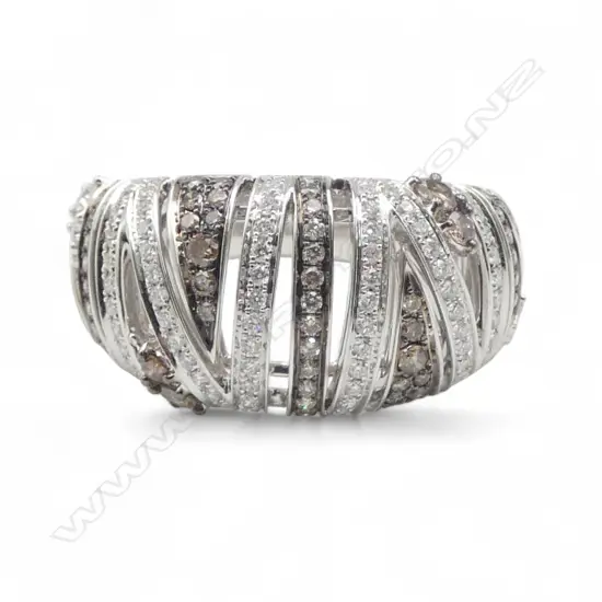 An 18ct black and white gold diamond ring,
