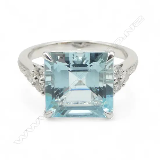 An 18ct white gold diamond and aquamarine ring,