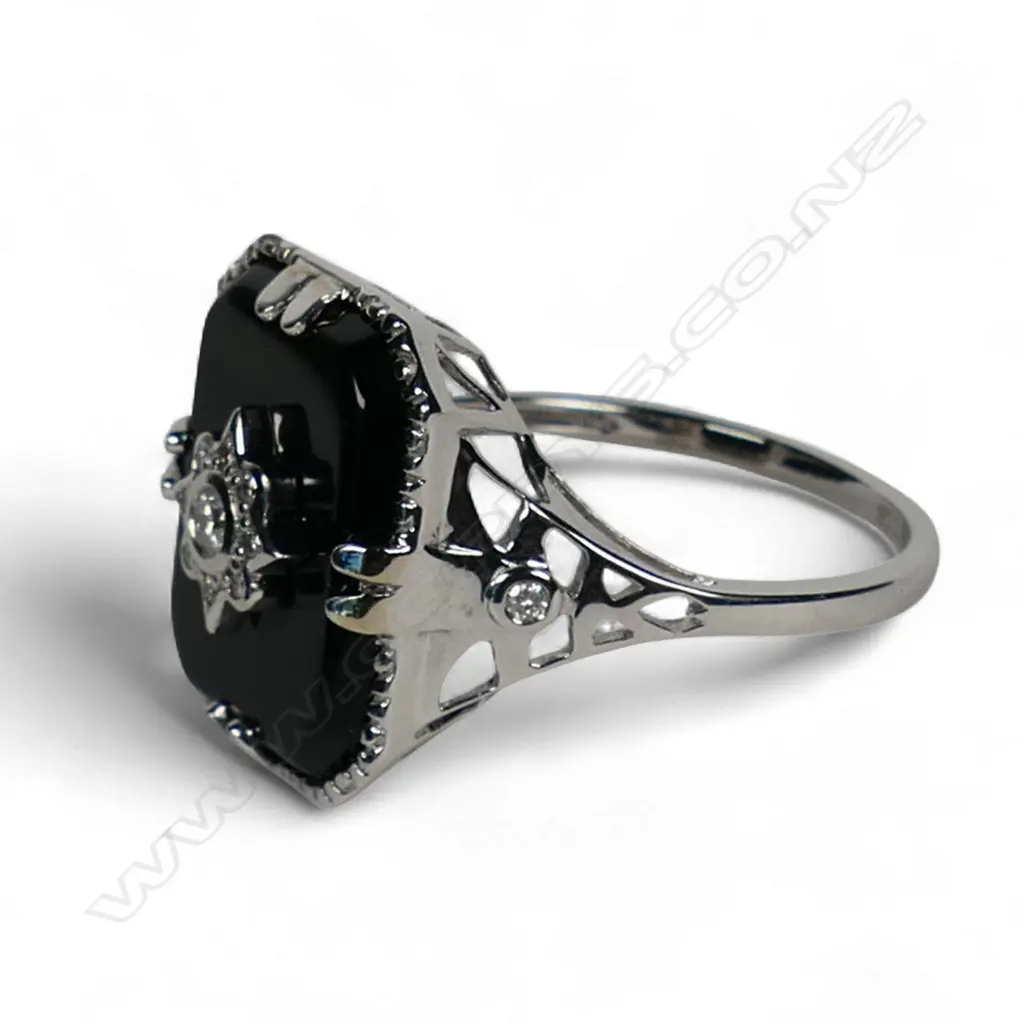 A 14ct white gold onyx and diamond Art Deco style ring, Image 1++