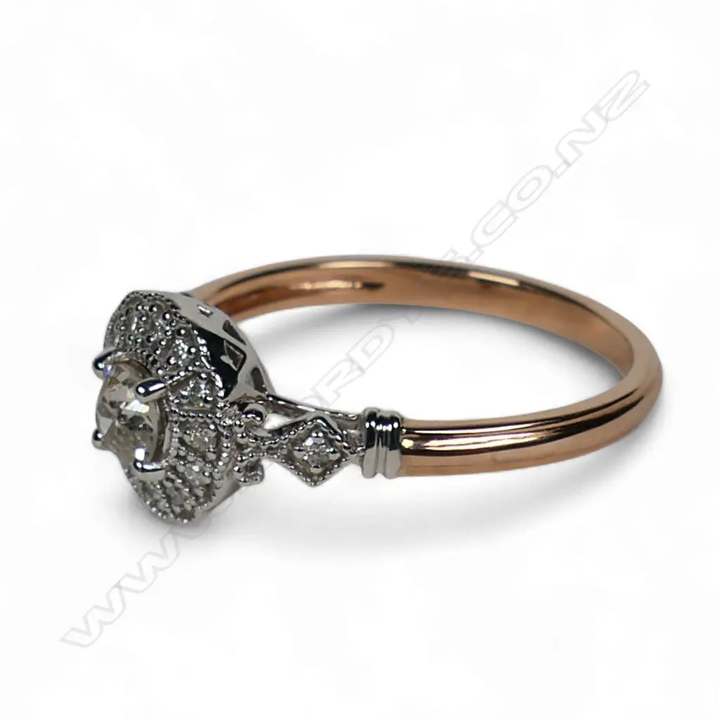 A 14ct rose and white gold antique style diamond ring, Image 1++