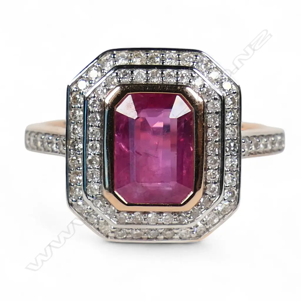 A 14ct rose gold ruby and diamond double halo ring, Image 1++
