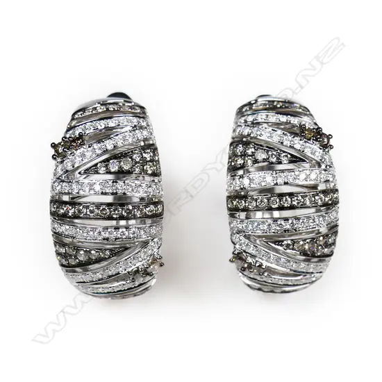 A pair of 18ct white and black gold diamond earrings,