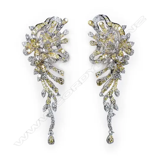 A pair of 18ct white gold yellow and white diamond earrings,