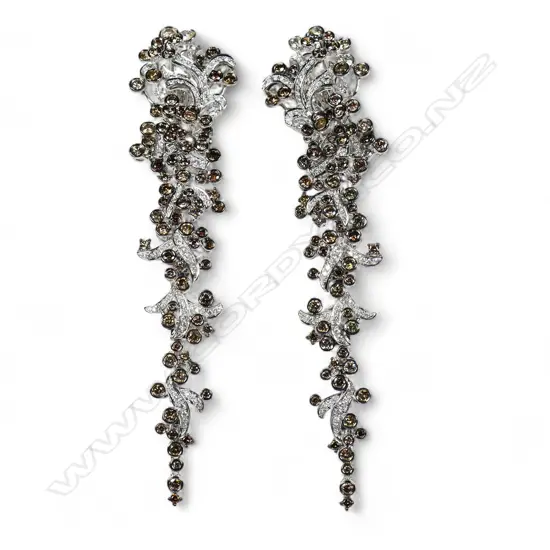 A pair of 18ct white and black gold diamond earrings,