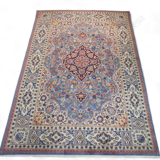 A fine hand-knotted Tabriz carpet,