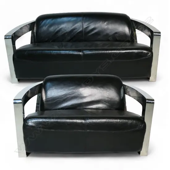 A pair of stylish Art Deco style 'Aviator' chrome and leather couches,