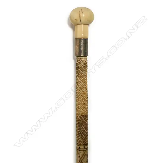 A late 19thC whalebone carved walking stick,