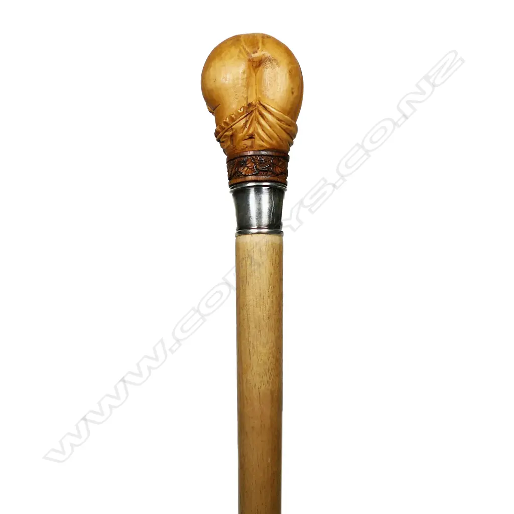 A walking stick with carved handle, Image 1++