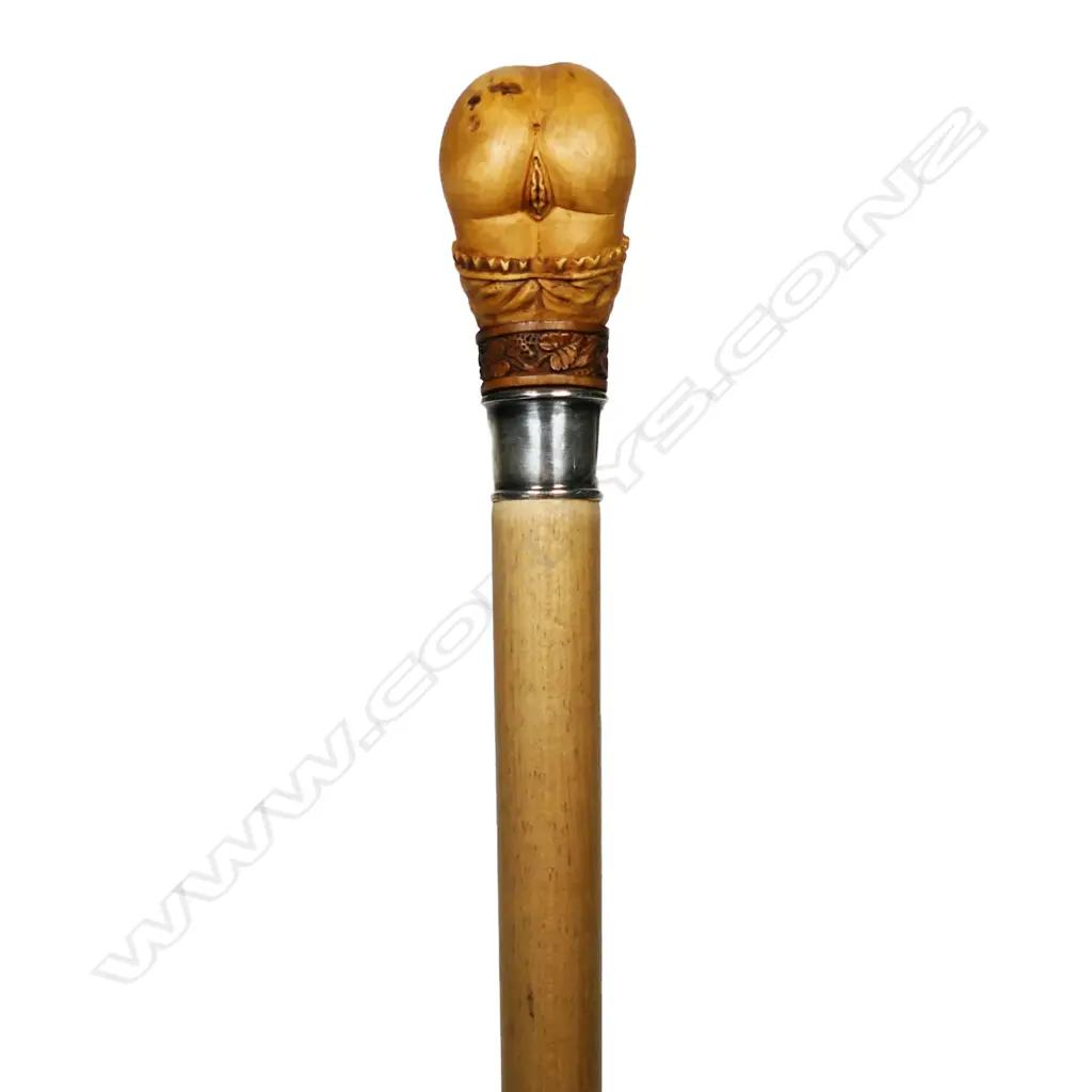 A walking stick with carved handle, Image 1++