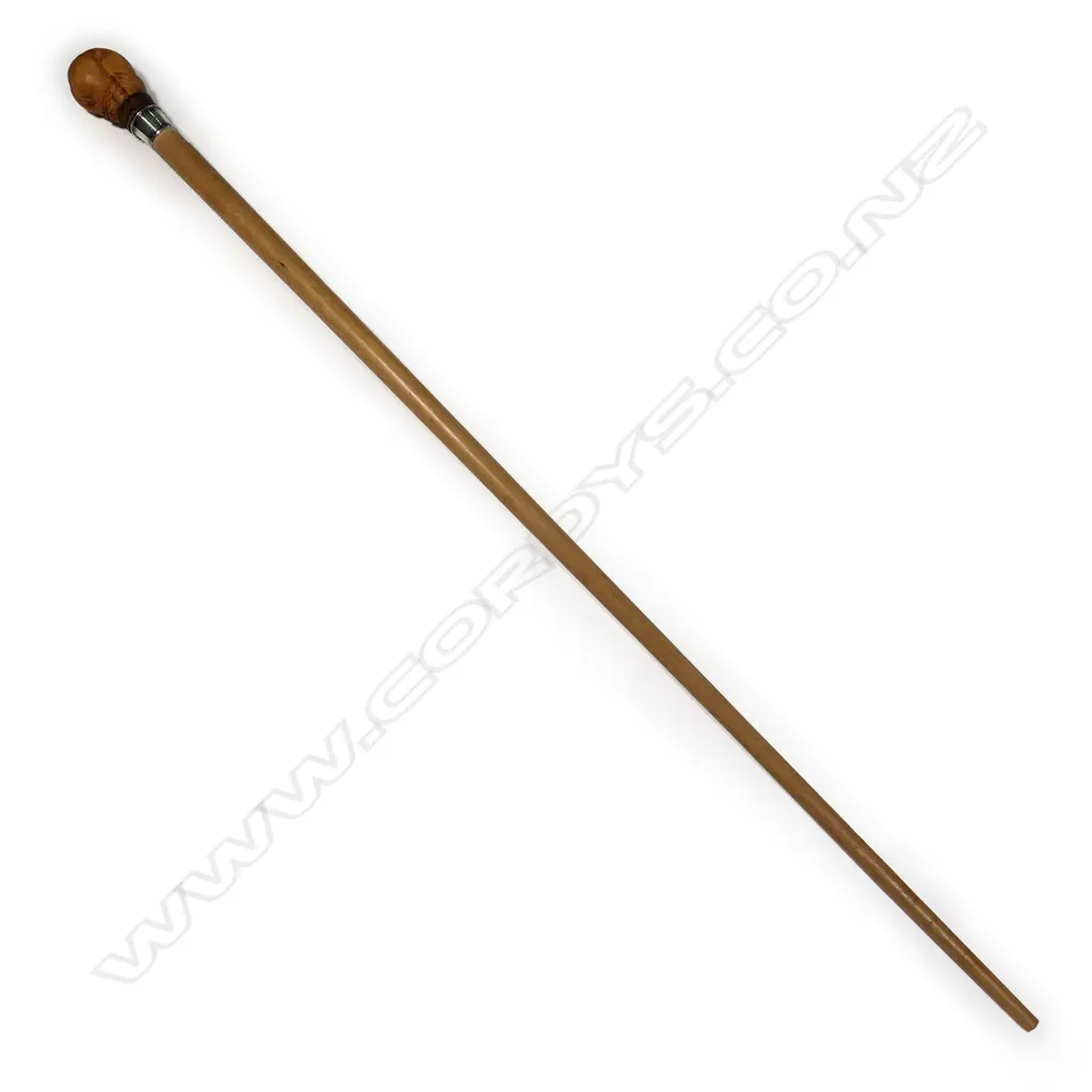 A walking stick with carved handle, Image 1++