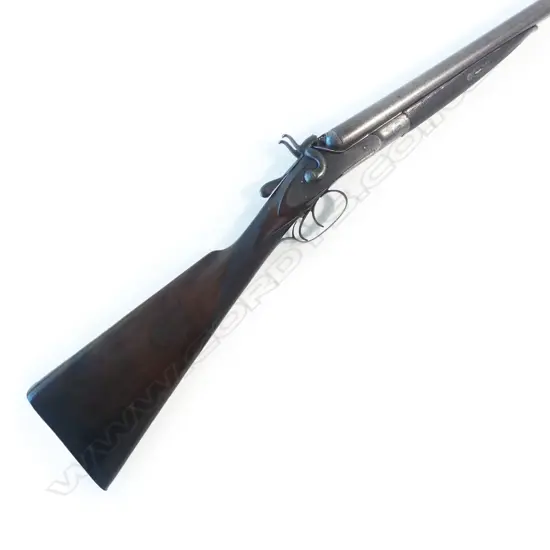 A 12-bore double barrel open-hammer shotgun by T. Newton, Manchester,