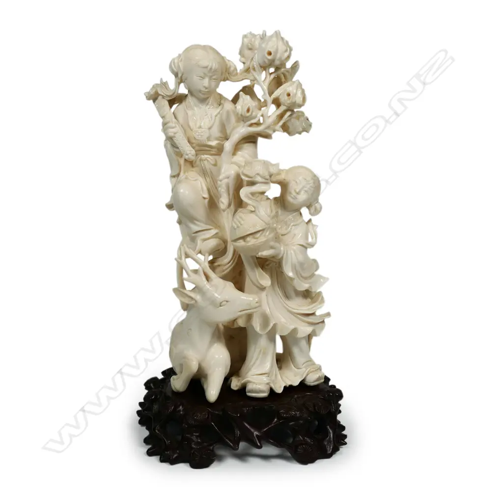 A finely carved Chinese ivory figure group, Image 1++
