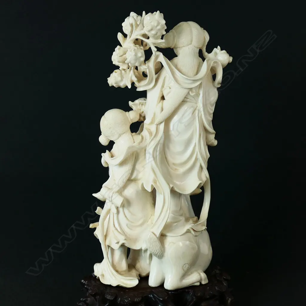 A finely carved Chinese ivory figure group, Image 1++
