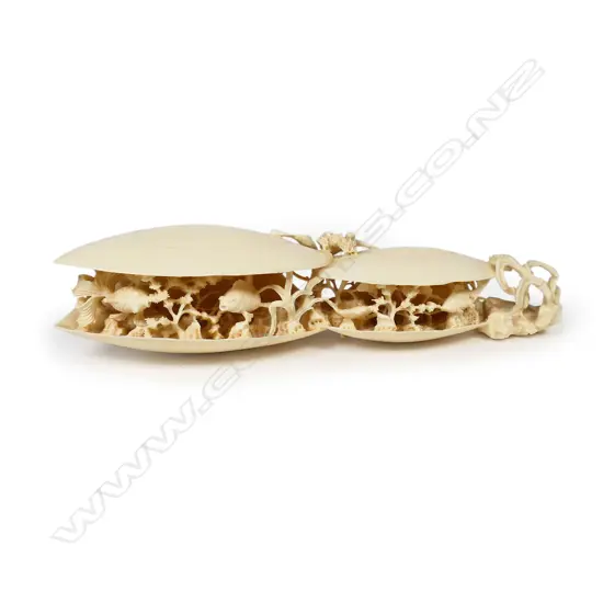A carved ivory double dream shell,
