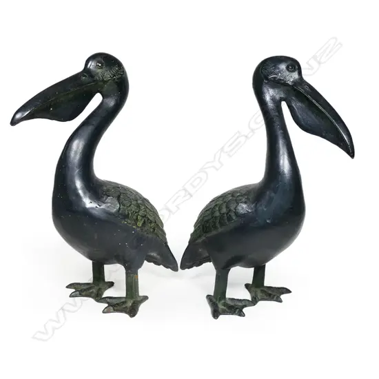 A characterful pair of bronze pelicans,