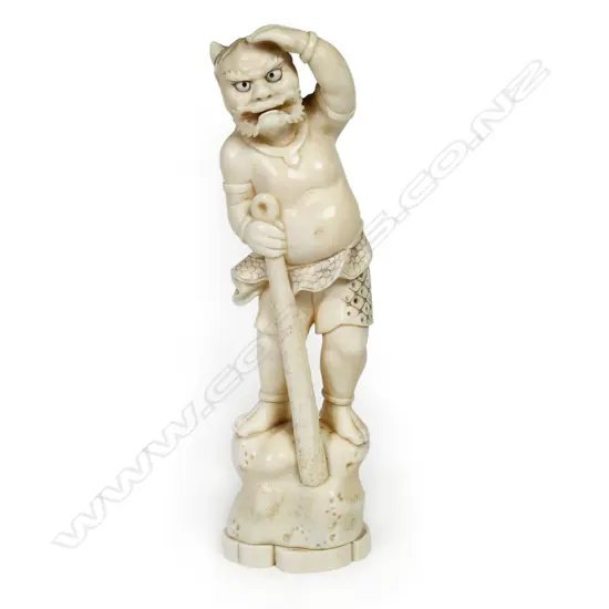 A finely carved Japanese ivory figure,