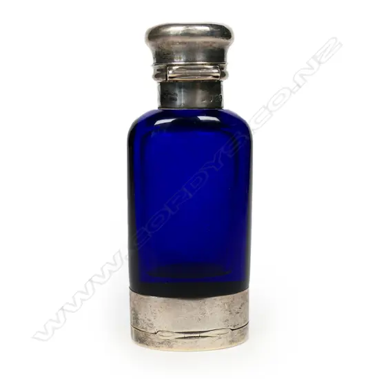 An uncommon silver and Bristol blue glass scent bottle combination vinaigrette,