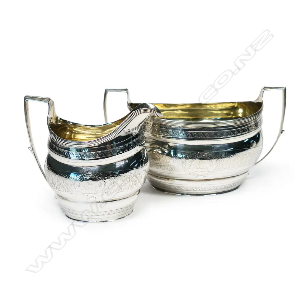 A pair of George III silver sugar bowl and cream jug, Image 1++