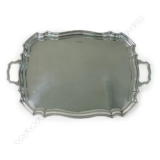 A heavy mid-20thC two handled silver tray,
