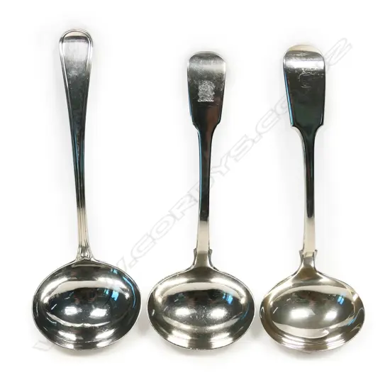 Three silver sauce ladles,