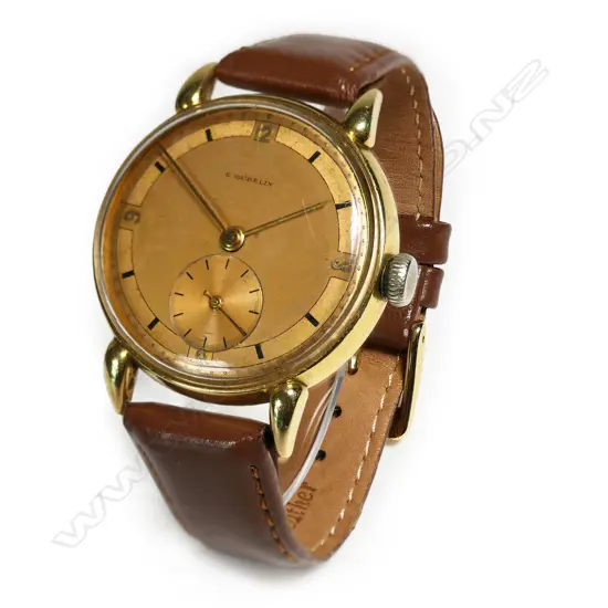 A c.1940's E. Gübelin gent's 18ct yellow gold wrist watch,