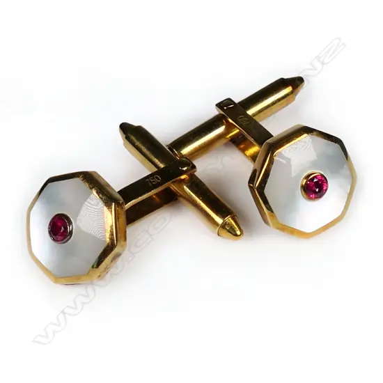 A pair of 18ct gold and ruby cuff links,