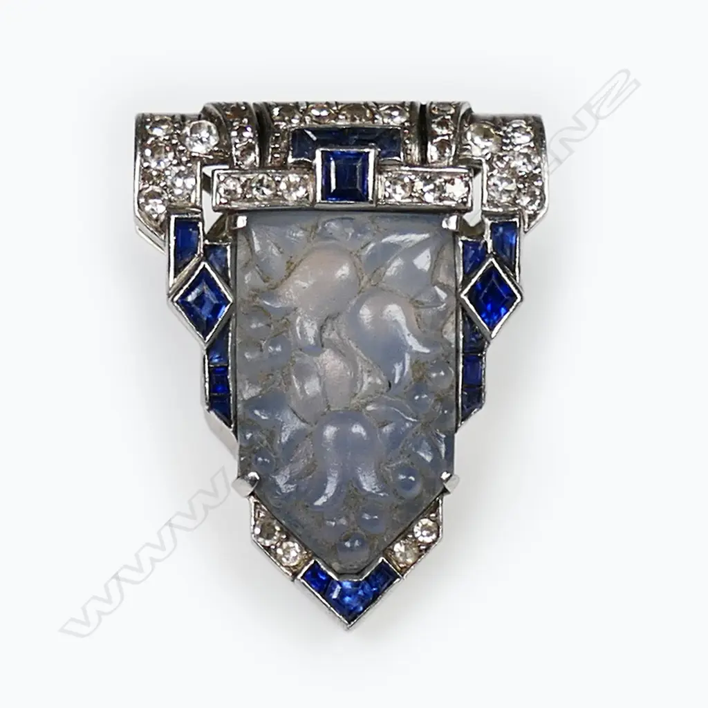 A quality Art Deco 18ct white gold carved hardstone sapphire and diamond dress clip, Image 1++